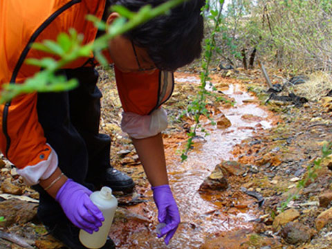 EBAYS student takes water sample from a creek, 2008