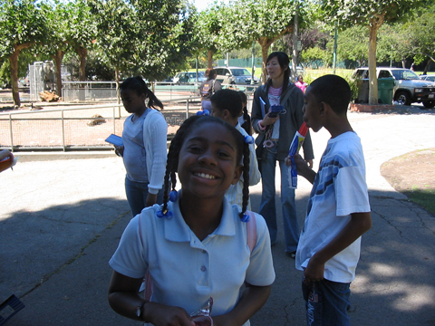 Student from Anna Yates Elementary stops for a photo, 2007